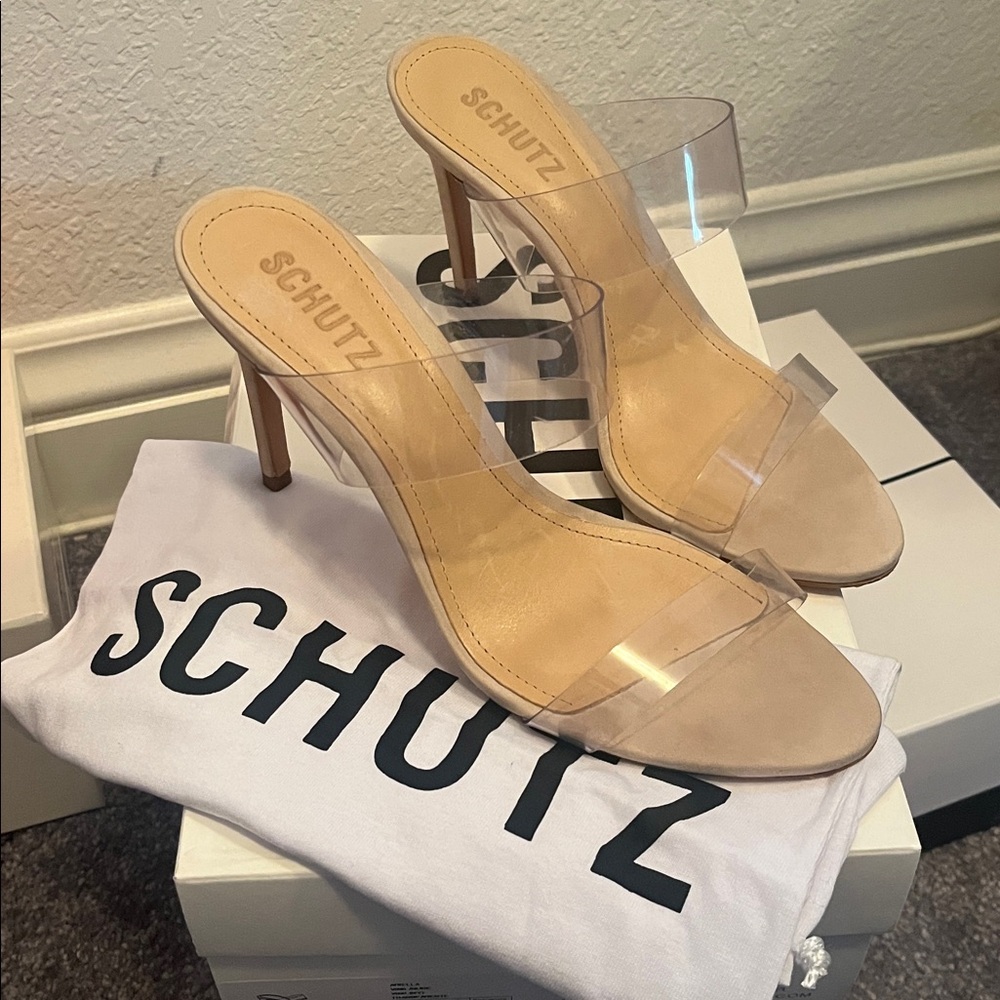 Schutz Ariella 4” clear vinyl bands size 8